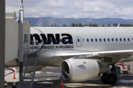 Departamentul de Justiţie a aprobat preluarea Northwest de către Delta Air Lines