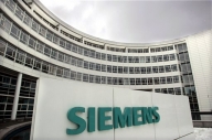 Siemens, amendă de 800 mil. dolari într-un scandal de corupţie