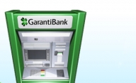 GarantiBank reduce dobânzile la credite