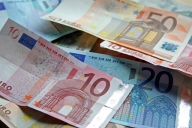 România va adopta euro cel mai probabil în ianuarie 2015
