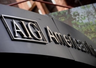 AIG şi-a redus pierderile trimestriale la 4,35 mld. dolari