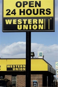 Criza afectează transferul de bani: Profitul Western Union a scăzut cu 5,2%