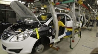 Magna ar putea concedia 10.500 dintre angajaţii Opel