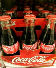 Coca-Cola preia operaţiunile celui mai mare îmbuteliator de băuturi al grupului