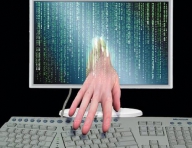 Trei hackeri, acuzaţi că au infectat 13 milioane de PC-uri, arestaţi în Spania