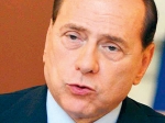 Berlusconi spune că ştie din surse sigure că Gaddafi vrea să-l elimine