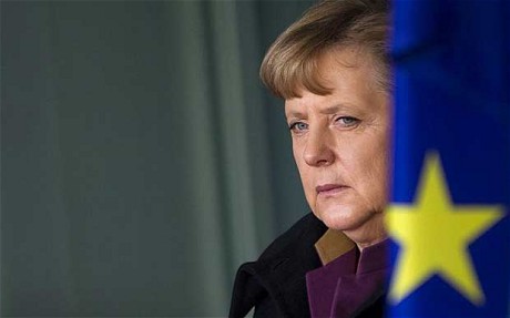 Merkel: Spania va primi ajutor financiar doar cu condiţia reformării sistemului bancar