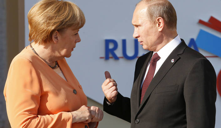 Întrunire între Putin și Merkel. S-a discutat despre revizuirea acordurilor de la Minsk