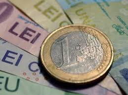 Moneda naţională s-a depreciat, miercuri, în raport cu euro