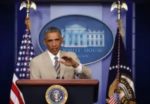 Costumul bej purtat de Obama inflamează reţelele sociale