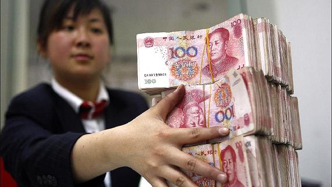 Atenţie: Moneda chineză s-ar putea PRĂBUŞI