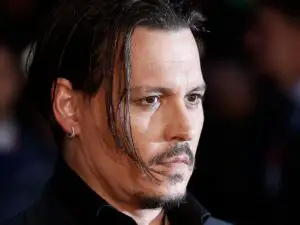 Johnny Depp, bătut de fosta nevastă. Fanii au luat-o razna