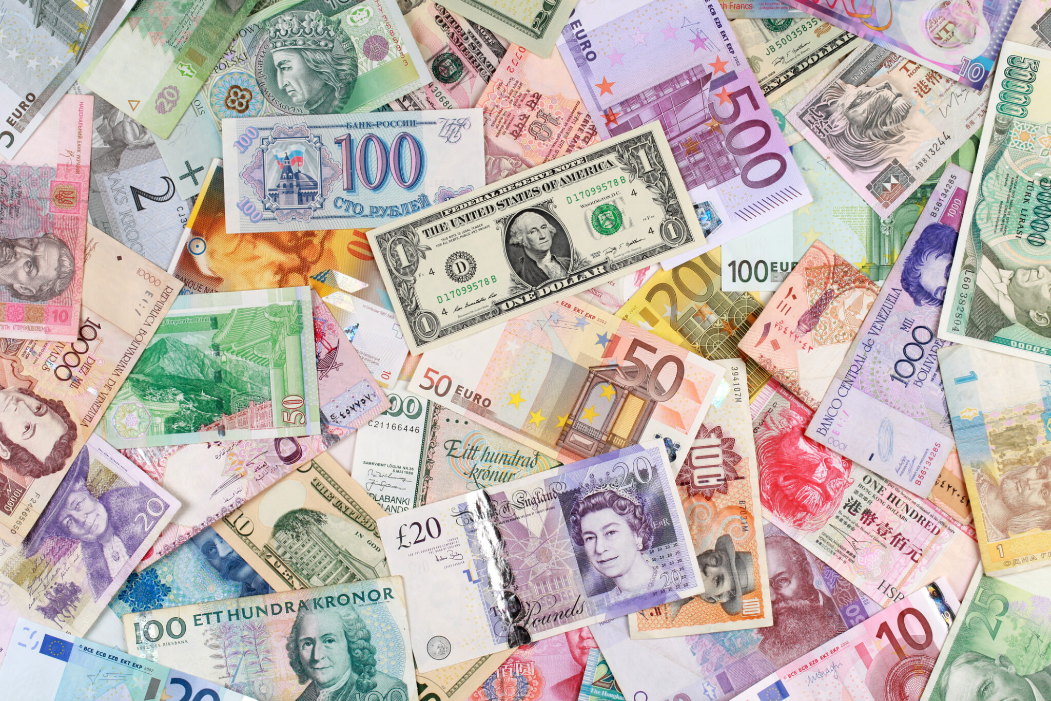 Денежный фон. Разноцветные деньги. Бумажные деньги. Деньги разные. Основные иностранные валюты