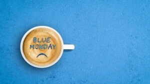 Blue Monday, ceașcă de cafea, față tristă