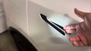 maner retractabil Tesla