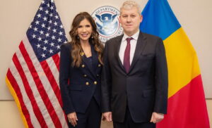 Kristi Noem, Cătălin Predoiu