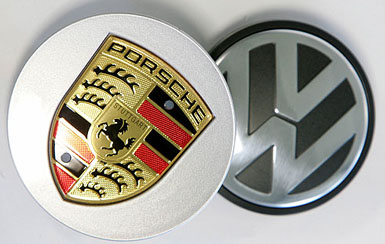 Volkswagen vrea să finalizeze preluarea Porsche înainte de august 2014