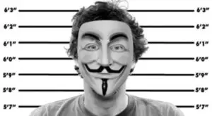 Interpolul a încept războiul cu Anonymous. 25 de hackeri arestaţi