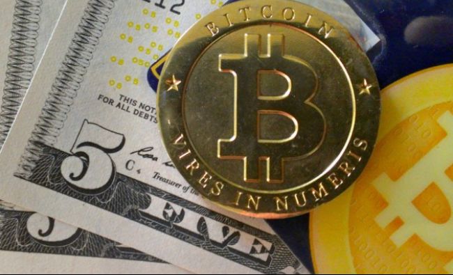 Bitcoin, nivel record de peste 1.200 de dolari pe unitate