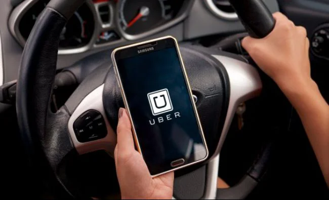 Uber doreşte o legislaţie pentru ride sharing