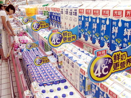 Apetitul chinezilor pentru laptele praf a crescut vânzările Danone