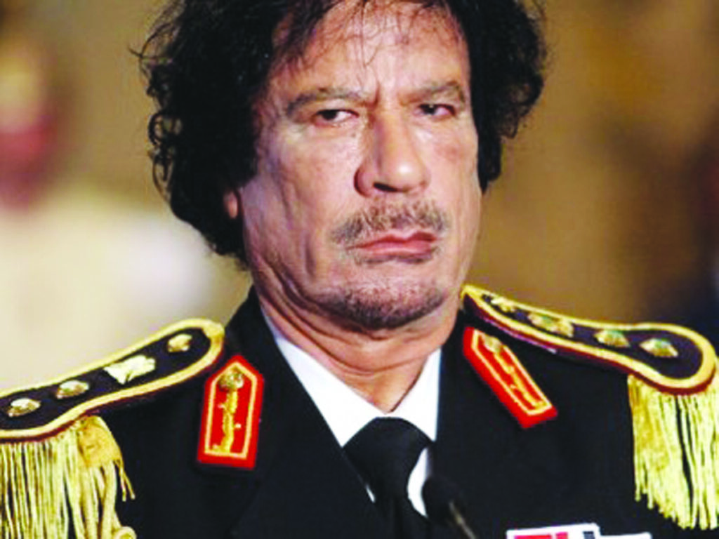Interpol a emis mandat de arestare pe numele lui Gaddafi