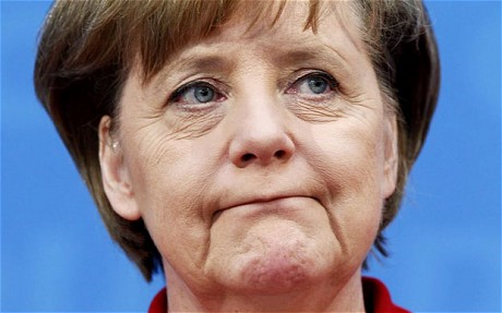 Angela Merkel se delimitează de declaraţiile ministrului german de interne privind Grecia