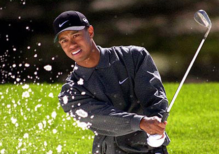 Tiger Woods, dat afară şi din propriul joc